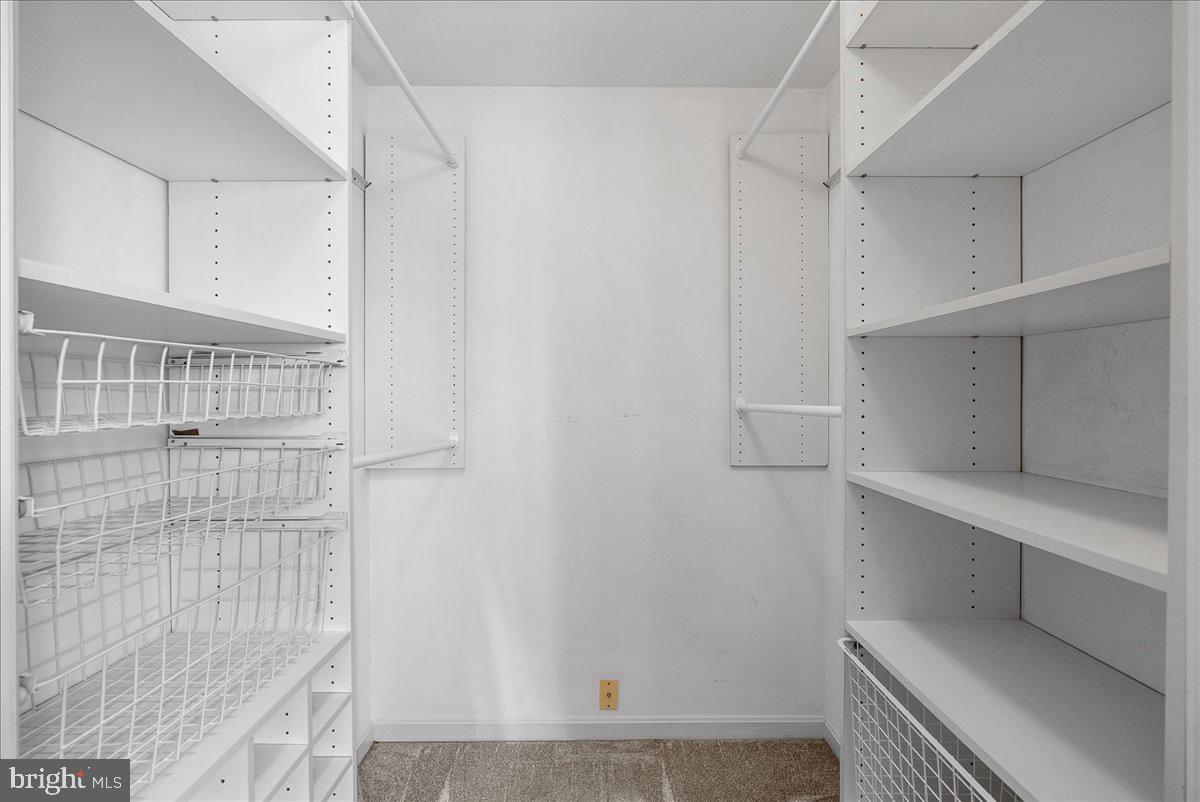 7930 Minor Hill Road Manassas, VA 20109 - Photo 22 of 26 a view of storage and utility room with empty racks