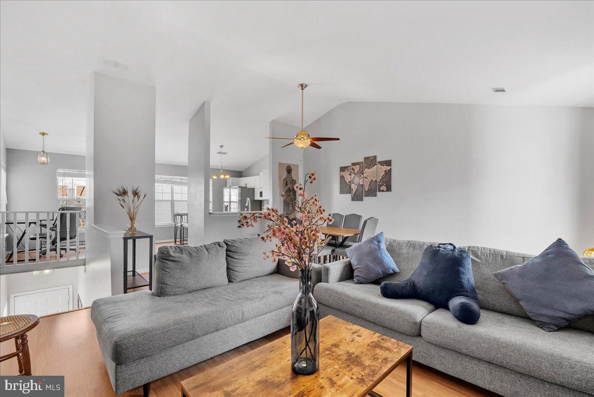 7930 Minor Hill Road Manassas, VA 20109 - Photo 26 of 26 a living room with furniture and a chandelier