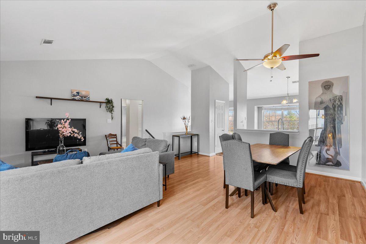 7930 Minor Hill Road Manassas, VA 20109 - Photo 3 of 26 a view of a dining room with furniture window and wooden floor