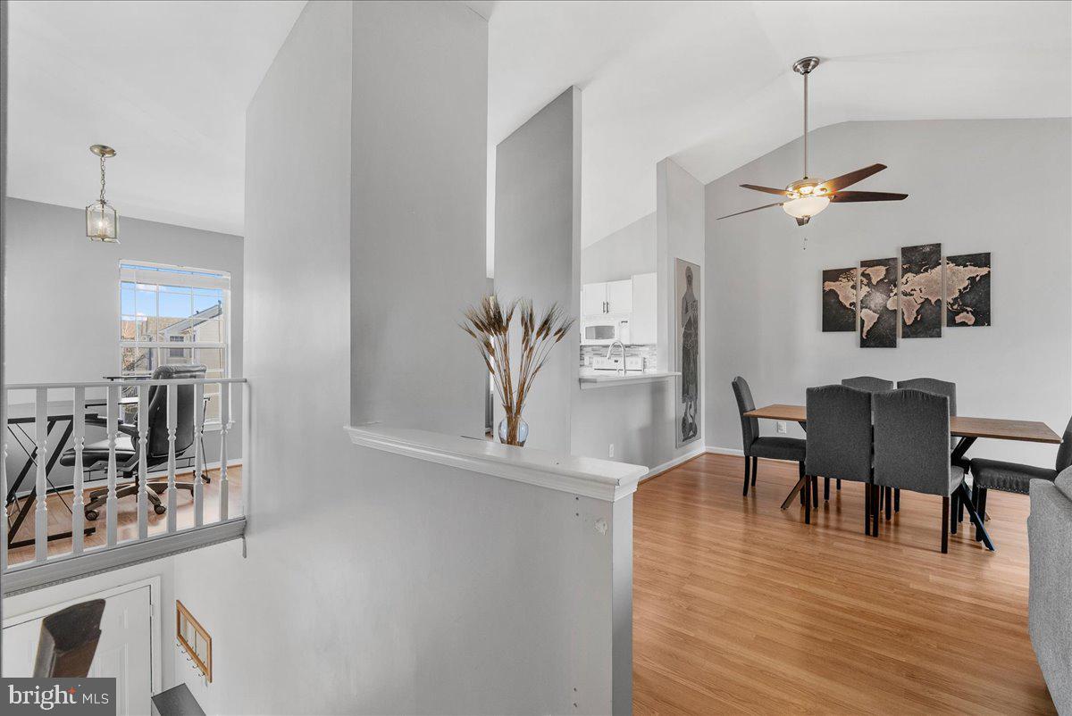 7930 Minor Hill Road Manassas, VA 20109 - Photo 5 of 26 a view of a dining room with furniture and wooden floor