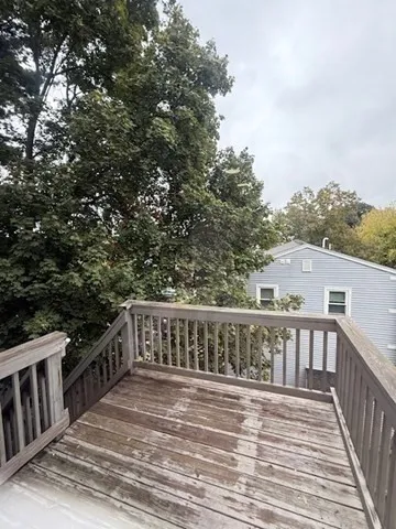 a view of a livingroom with wooden floor