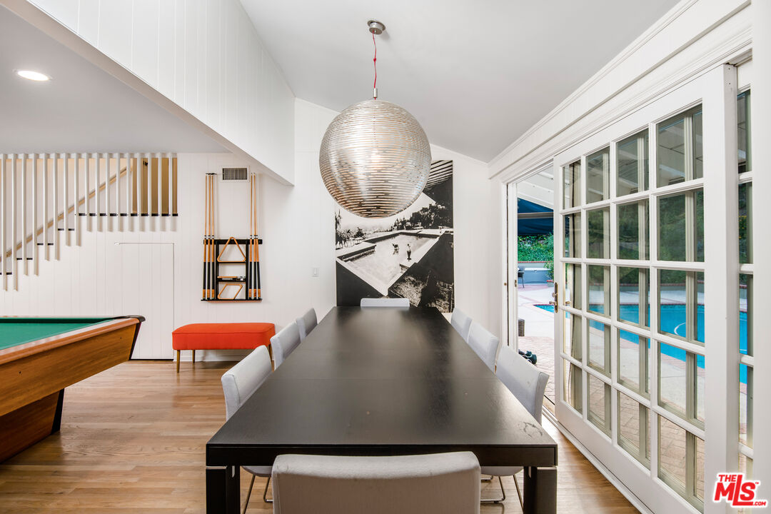 16849 Adlon Road Encino, CA 91436 - Photo 6 of 40 a view of a living room and workspace