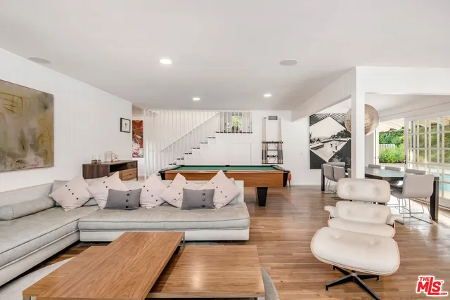 a living room with furniture and a couch