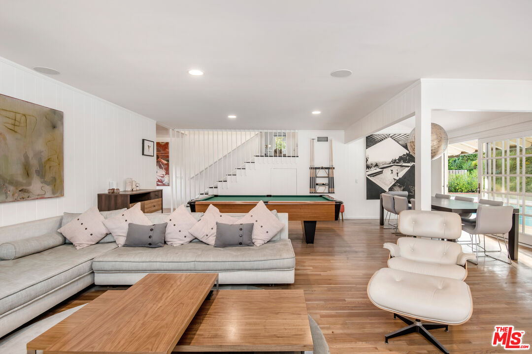 16849 Adlon Road Encino, CA 91436 - Photo 7 of 40 a living room with furniture and a couch