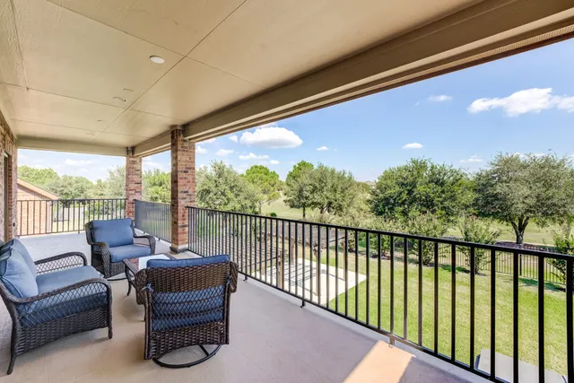 a balcony with furniture