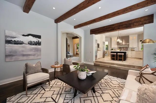 a bedroom with a bed and large window