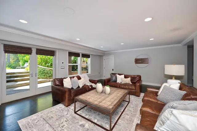 a bedroom with a bed and a view of bathroom