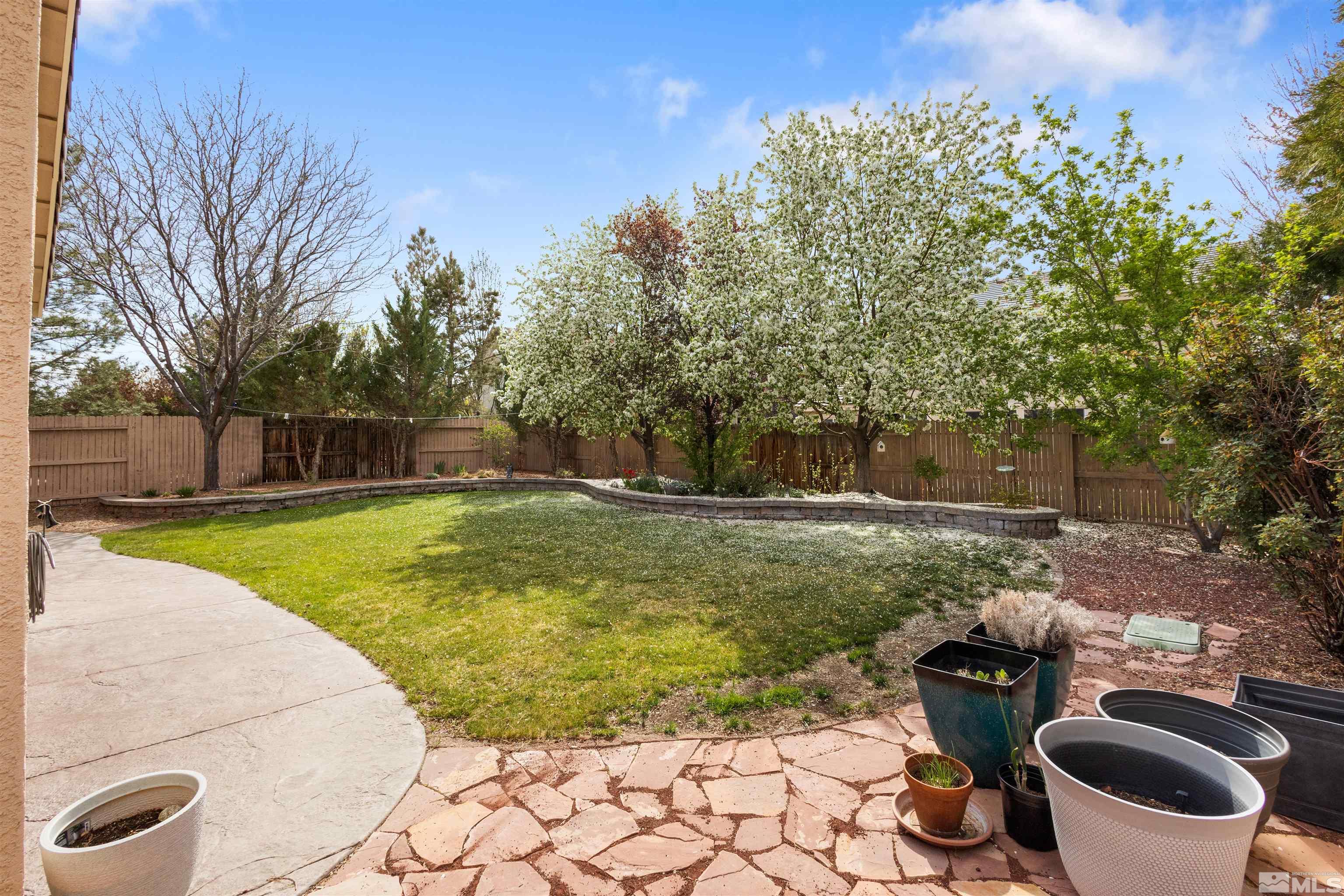 10521 Fort Morgan Way Reno, NV 89521 - Photo 32 of 35 a view of a backyard with swimming pool