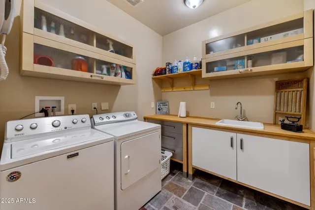a view of dining room with furniture and window