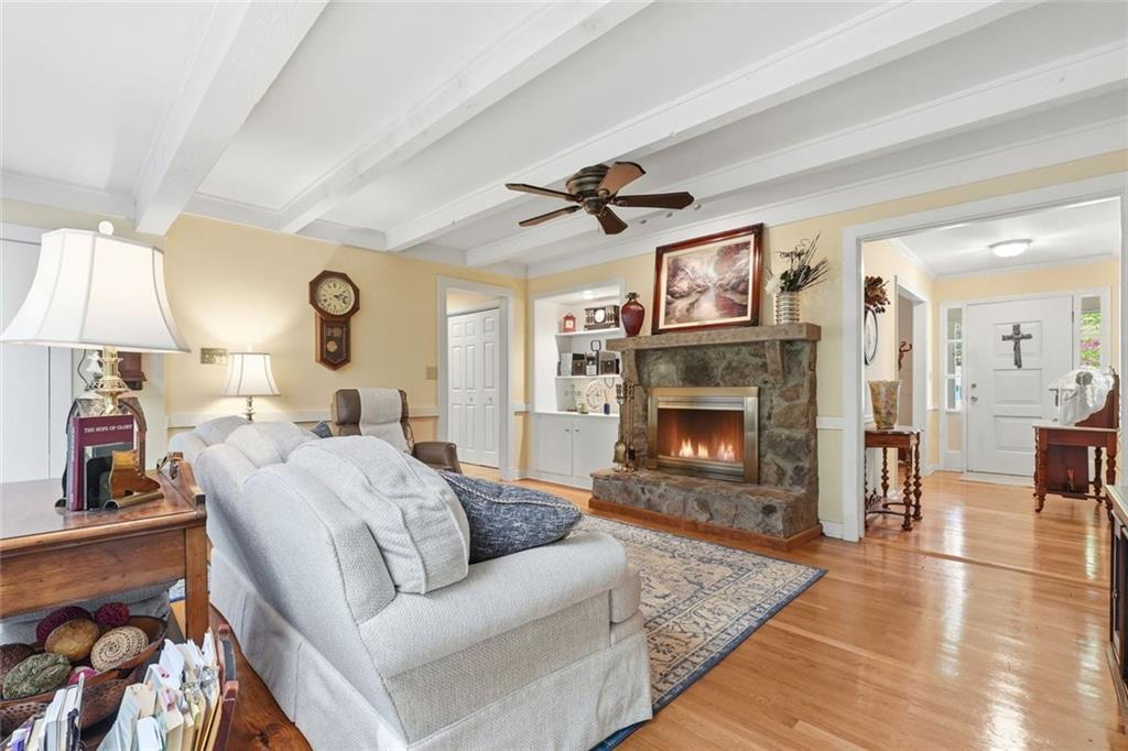 1837 Chancery Lane Atlanta, GA 30341 - Photo 17 of 46 a living room with furniture and a fireplace
