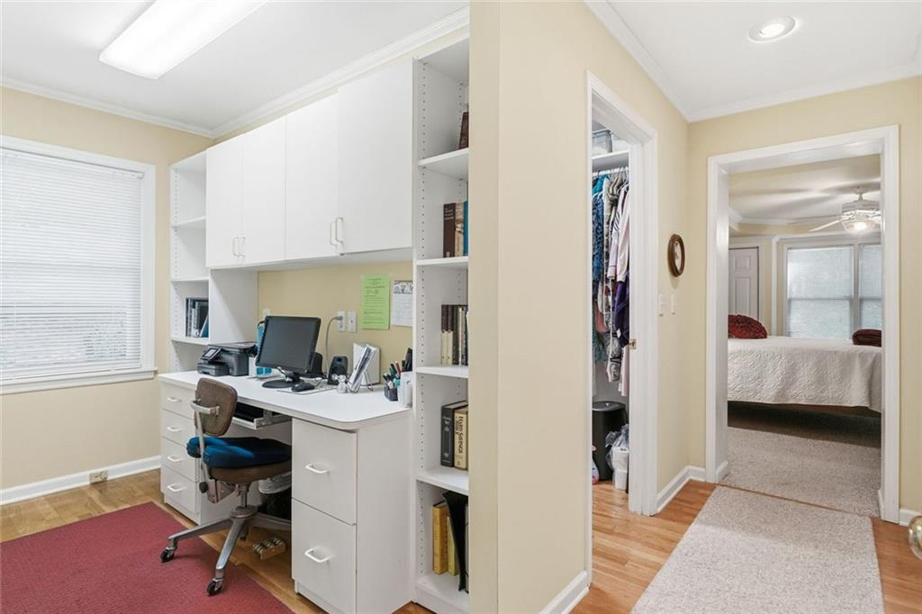 1837 Chancery Lane Atlanta, GA 30341 - Photo 27 of 46 a view of a workspace with furniture and a bedroom