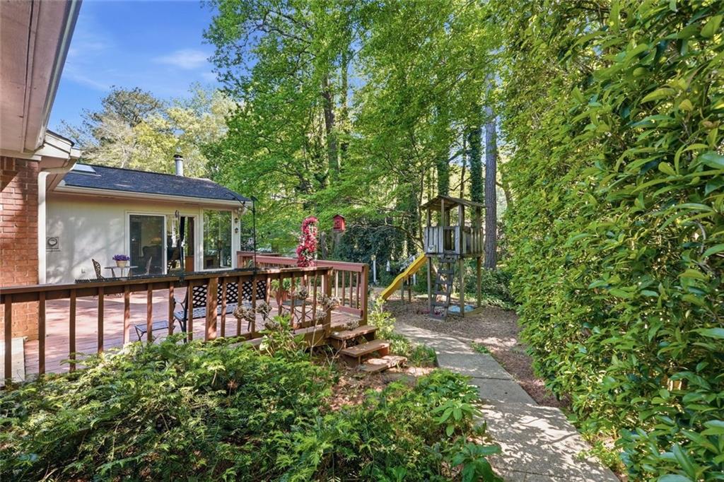 1837 Chancery Lane Atlanta, GA 30341 - Photo 41 of 46 a view of a house with backyard and sitting area
