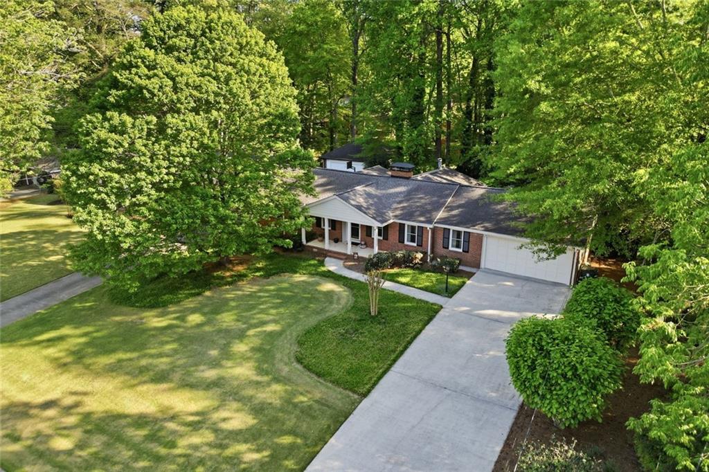 1837 Chancery Lane Atlanta, GA 30341 - Photo 46 of 46 a aerial view of a house next to a big yard and large trees