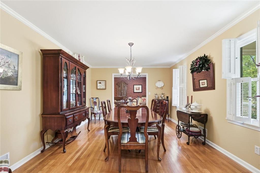 1837 Chancery Lane Atlanta, GA 30341 - Photo 8 of 46 a view of a dining room with furniture window and wooden floor
