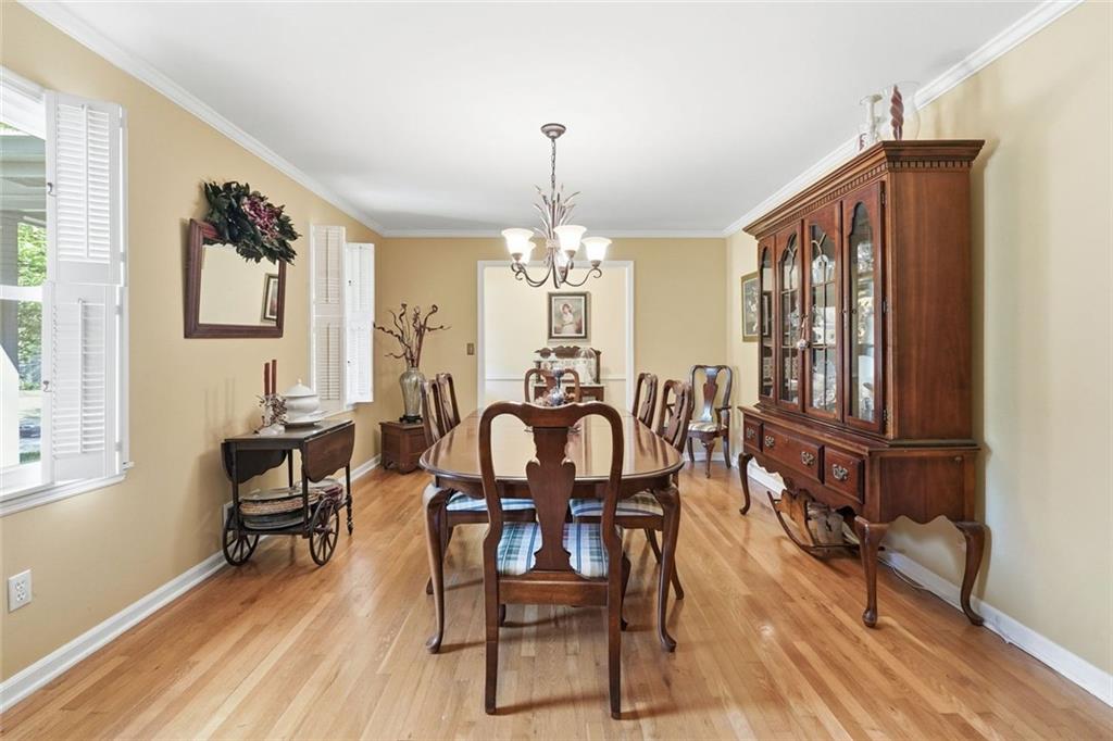 1837 Chancery Lane Atlanta, GA 30341 - Photo 9 of 46 a view of a dining room with furniture window and wooden floor