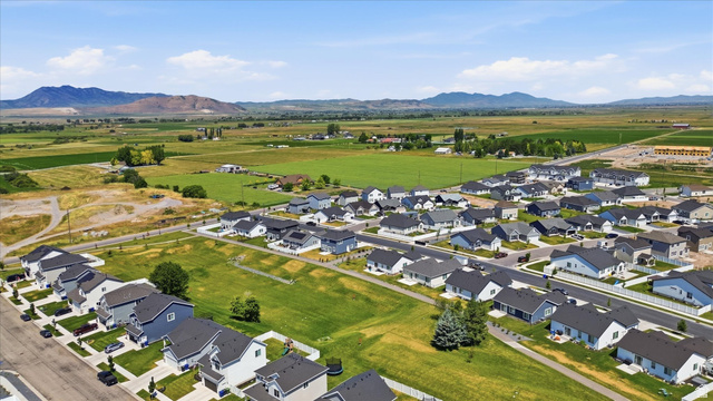 730 West 500 North Smithfield, UT 84335 - Photo 43 of 46 Expansive residential development featuring a collection of modern homes with dark roofs and light-colored siding