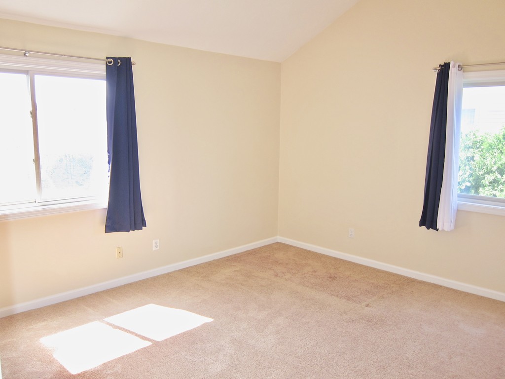 243 Captain Eames Circle, Unit 243 Ashland, MA 01721 - Photo 14 of 16 an empty room with a window