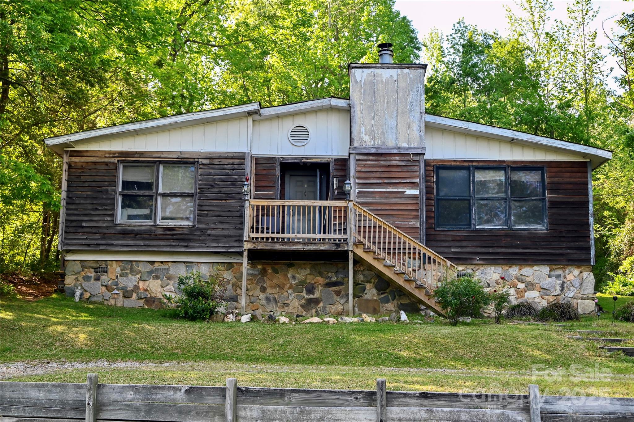 1042 Jackson Road Fort Lawn, SC 29714 - Photo 3 of 17 a front view of a house with garden