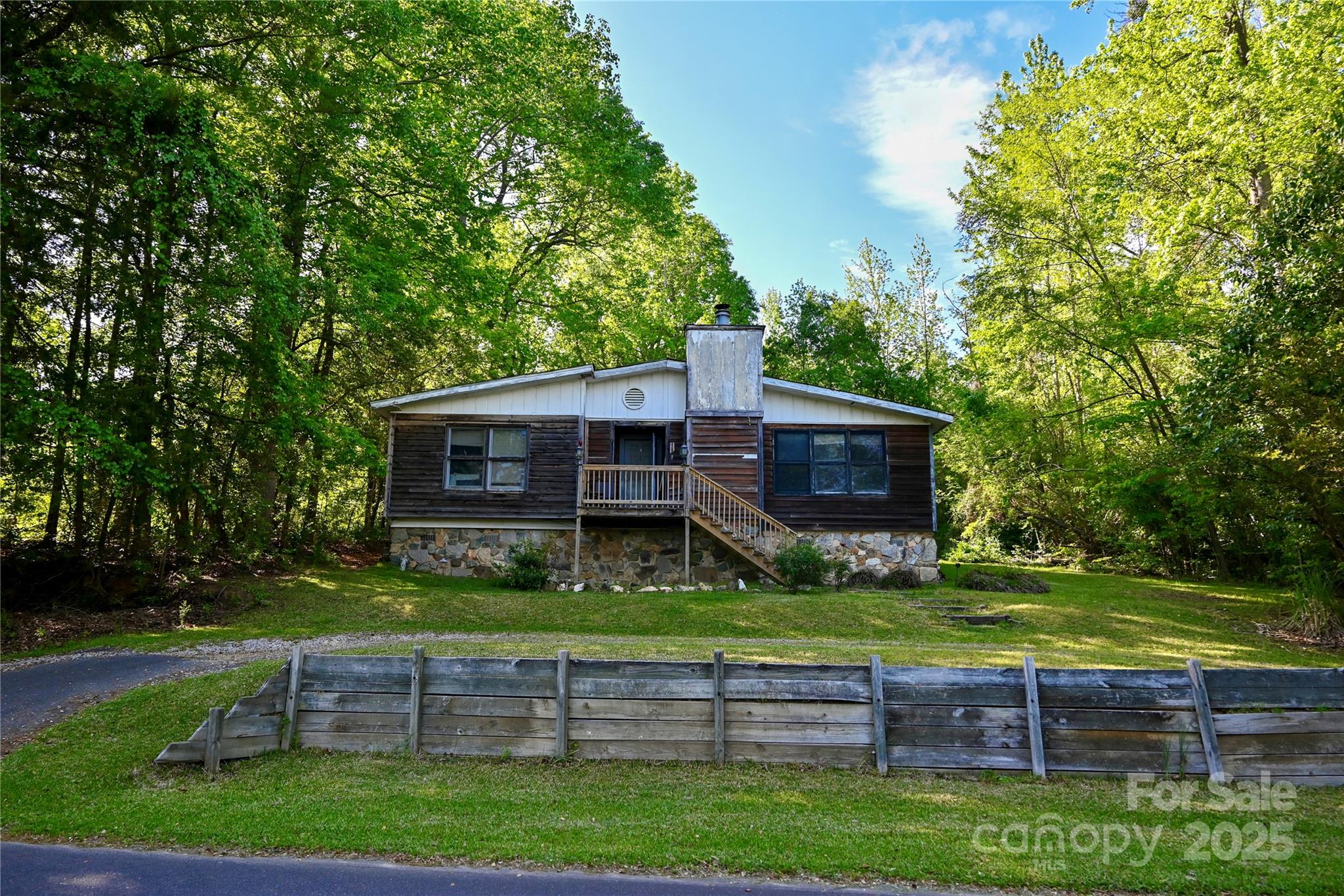 1042 Jackson Road Fort Lawn, SC 29714 - Photo 7 of 17 a front view of a house with garden