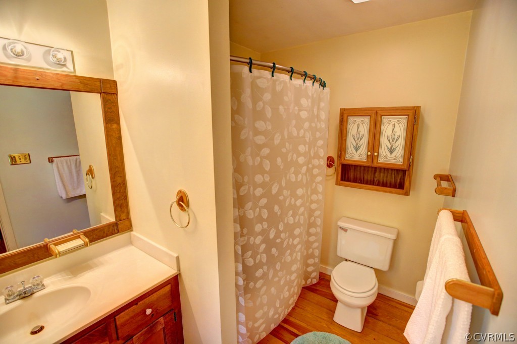 3070 Poor House Road Goochland, VA 23063 - Photo 17 of 24 a bathroom with a sink toilet and shower