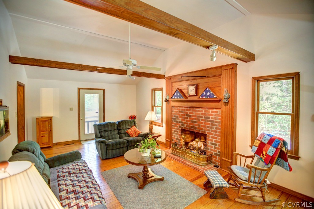 3070 Poor House Road Goochland, VA 23063 - Photo 10 of 24 a bedroom with furniture and a fireplace