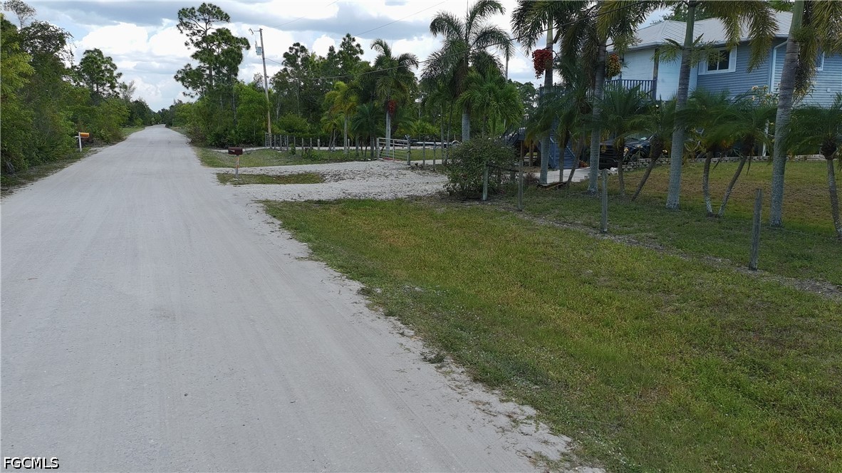 6430 Mannheim Road Bokeelia, FL 33922 - Photo 8 of 9 a view of a street with a building in the background