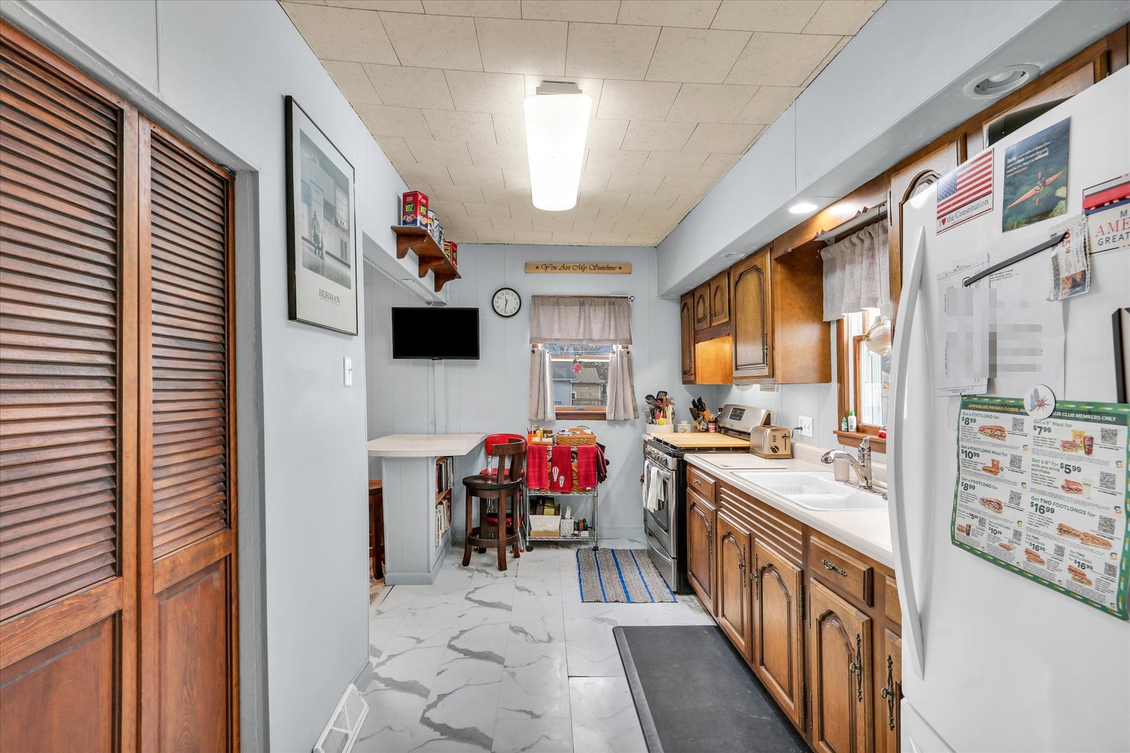 202 East Sherman Street St. Joseph, IL 61873 - Photo 11 of 24 a view of a kitchen with furniture and window
