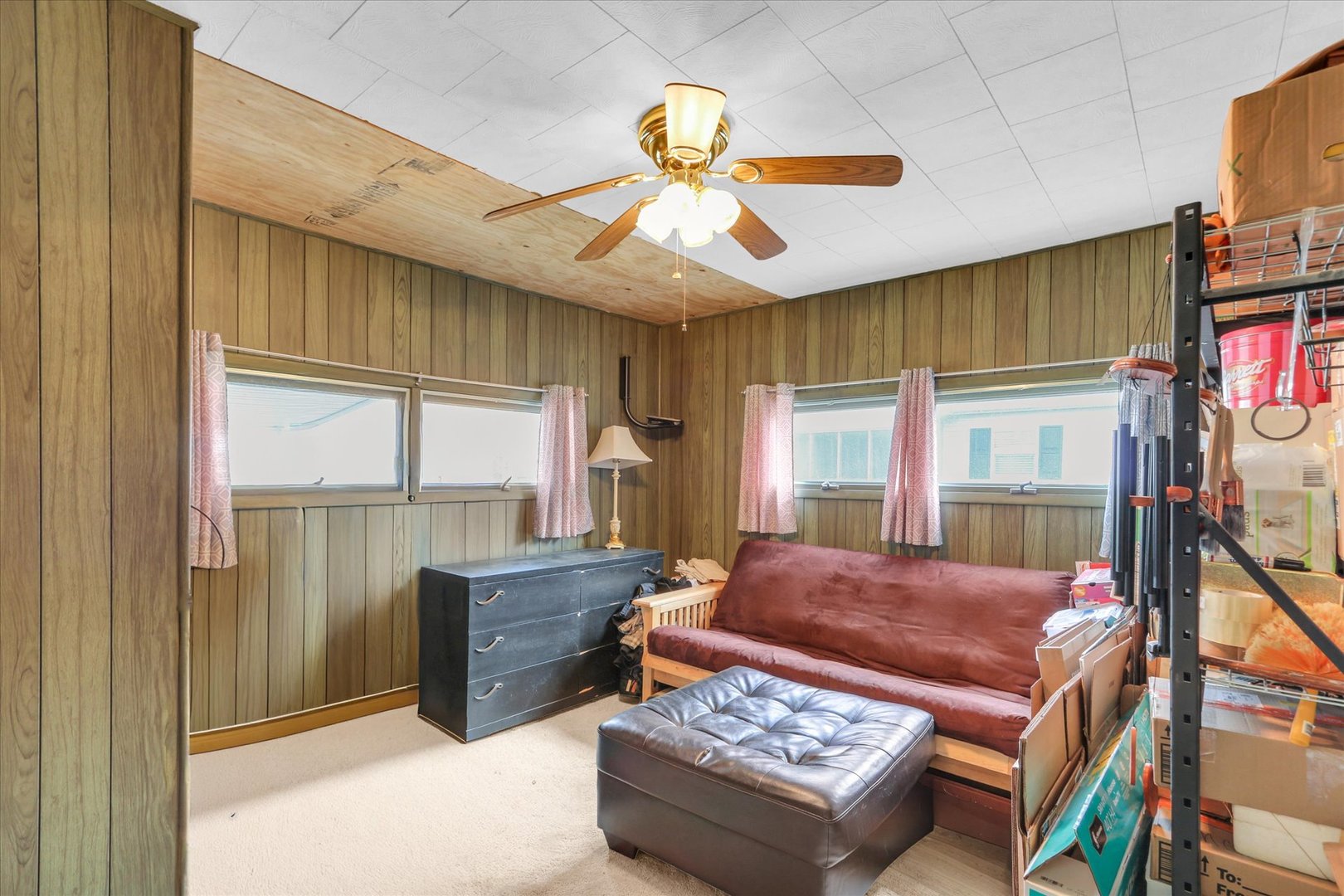 202 East Sherman Street St. Joseph, IL 61873 - Photo 15 of 24 a living room with furniture a fireplace and a chandelier