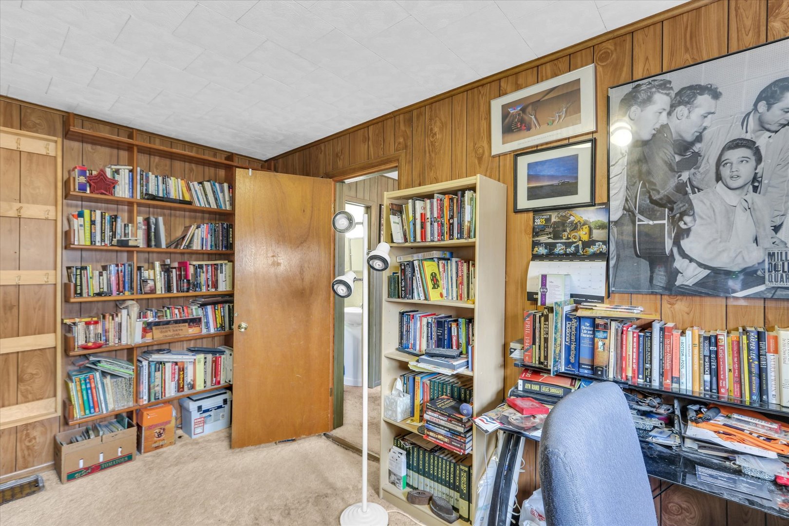 202 East Sherman Street St. Joseph, IL 61873 - Photo 18 of 24 a view of a book shelf with lots of books