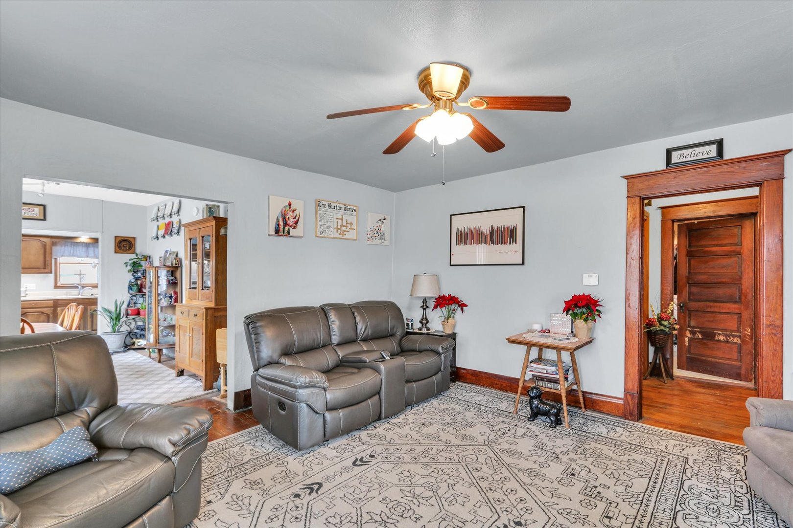202 East Sherman Street St. Joseph, IL 61873 - Photo 7 of 24 a living room with furniture and a wooden floor