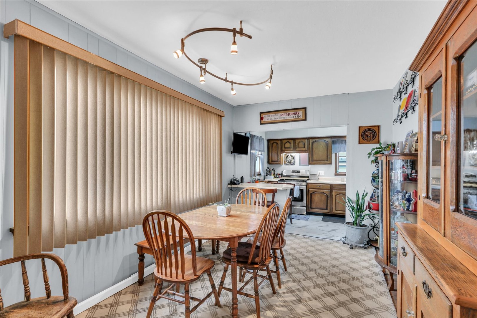 202 East Sherman Street St. Joseph, IL 61873 - Photo 8 of 24 a view of a a dining room with furniture window and wooden floor