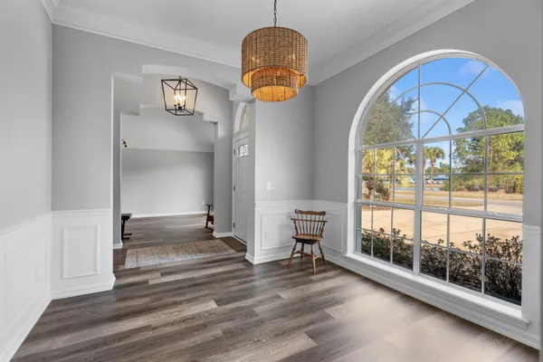 a view of a swimming pool with a patio and yard