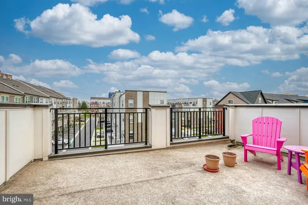 a view of a terrace with sitting area