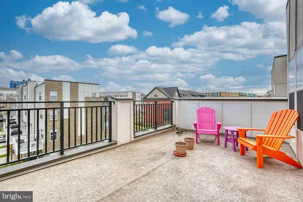 an outdoor sitting area with golf course