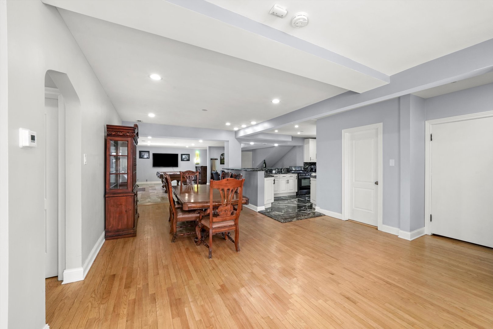 2022 West 95th Street Chicago, IL 60643 - Photo 12 of 21 a dining room with furniture and wooden floor