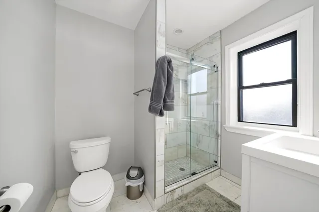 a kitchen with stainless steel appliances granite countertop a refrigerator sink and cabinets