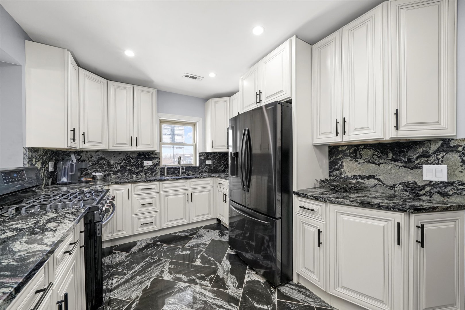 2022 West 95th Street Chicago, IL 60643 - Photo 16 of 21 a kitchen with stainless steel appliances granite countertop a refrigerator sink and cabinets