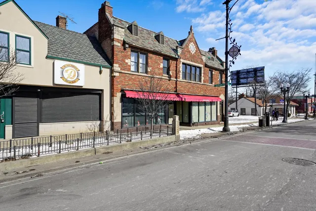 a view of a building with a street