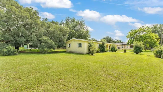 a view of house with outdoor space