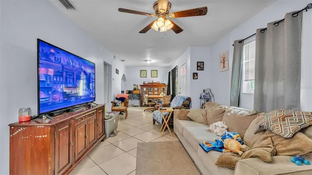 a living room with furniture and window
