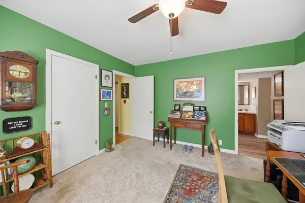 a bedroom with furniture and a bed