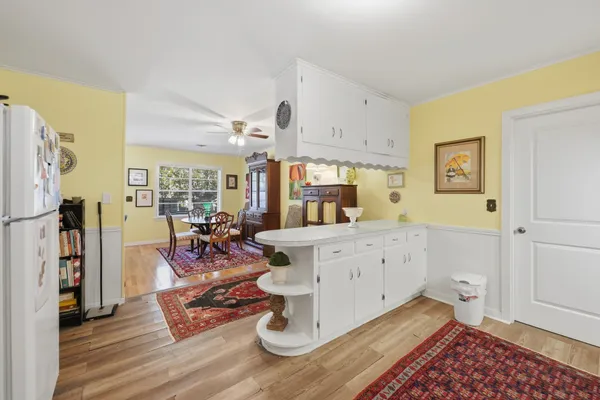 a very nice looking room with wooden floor