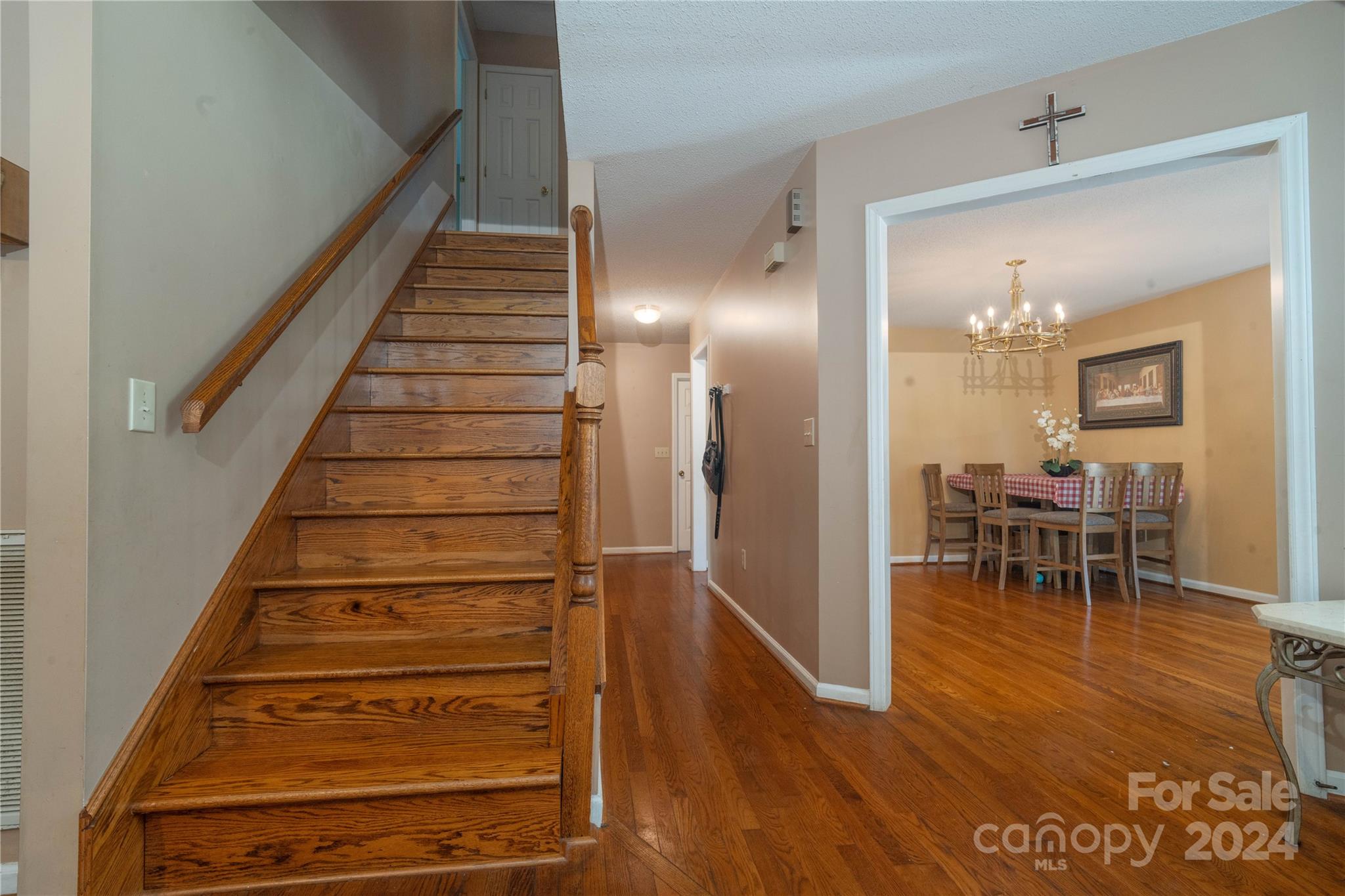 4710 Bert Huffman Drive Granite Falls, NC 28630 - Photo 15 of 28 a view of entryway with wooden floor and dining room