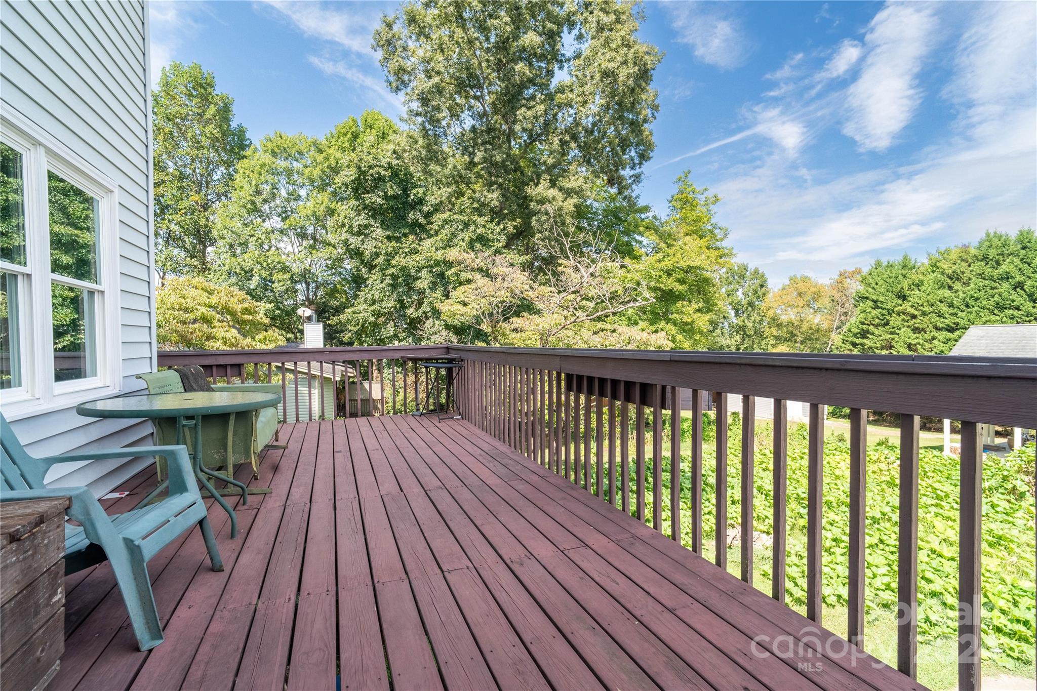 4710 Bert Huffman Drive Granite Falls, NC 28630 - Photo 26 of 28 a view of balcony with wooden floor and seating