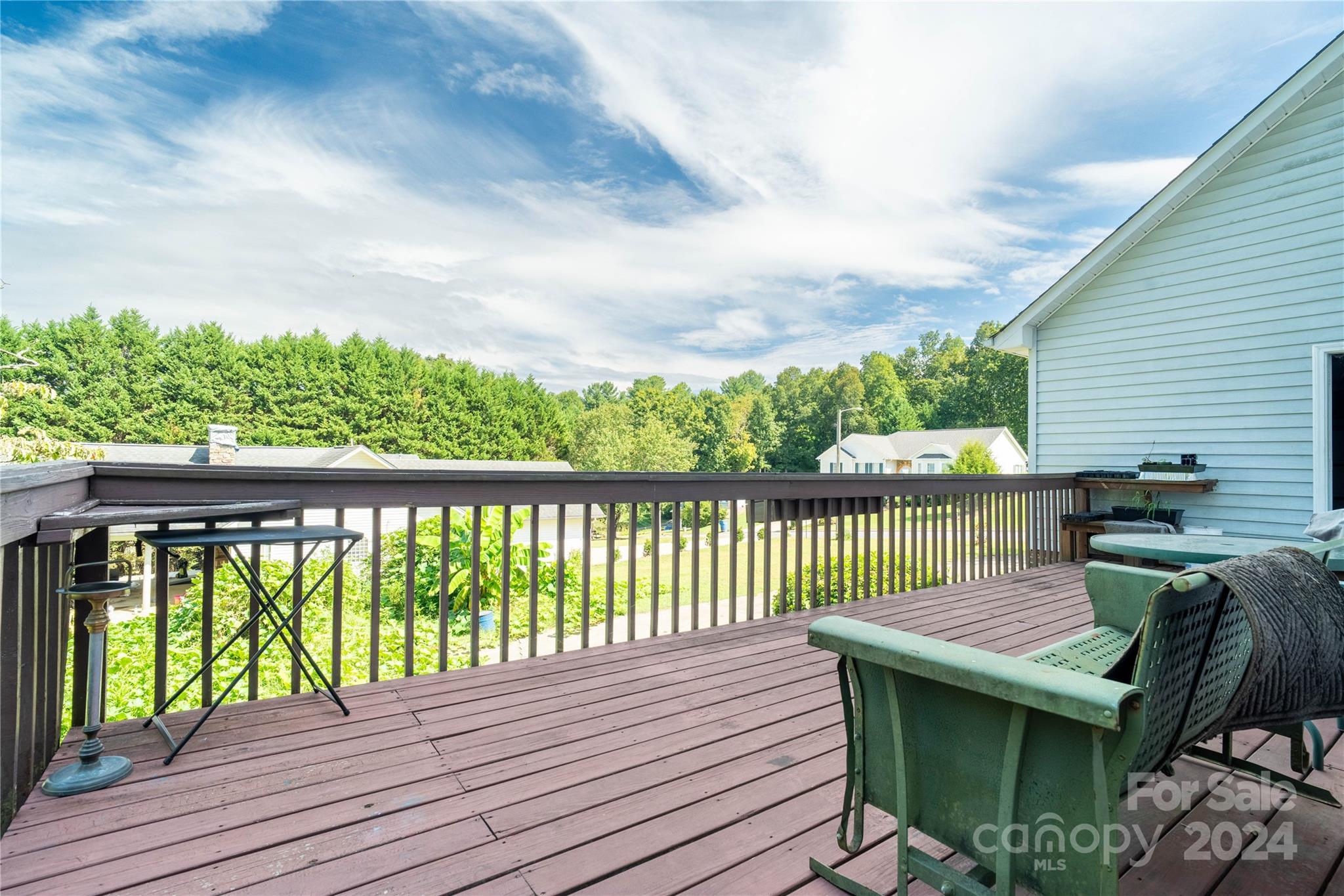 4710 Bert Huffman Drive Granite Falls, NC 28630 - Photo 28 of 28 a view of a wooden chairs on the roof deck