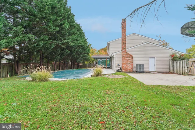 an aerial view of a house with a garden