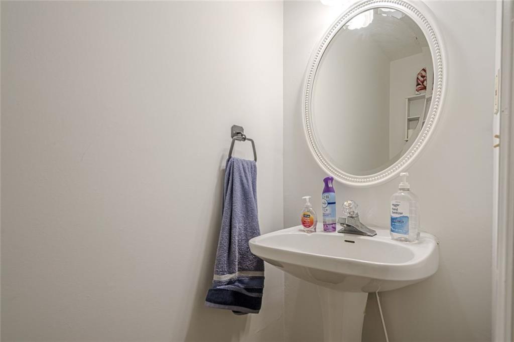 3403 Spring Harbour Drive Doraville, GA 30340 - Photo 20 of 27 a bathroom with a sink and a mirror