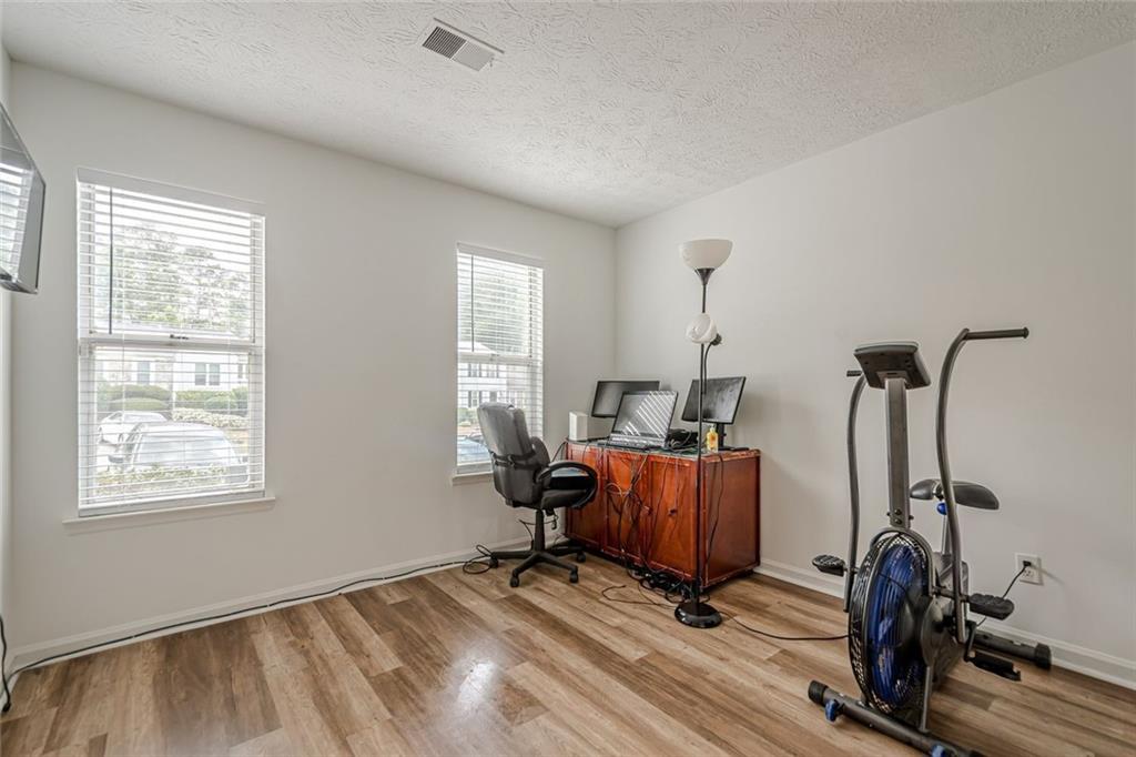 3403 Spring Harbour Drive Doraville, GA 30340 - Photo 9 of 27 a view of a room with gym equipment