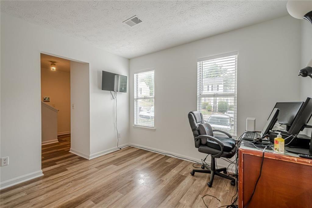 3403 Spring Harbour Drive Doraville, GA 30340 - Photo 10 of 27 a view of a workspace with furniture and a window