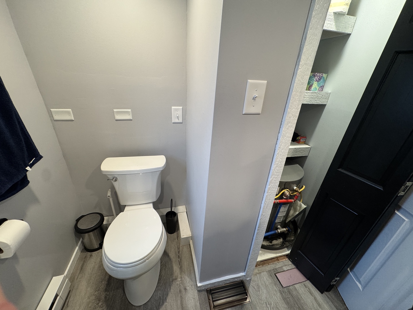 2-280 Woodhaven Sublette, IL 61367 - Photo 13 of 17 a white toilet sitting next to a white sink and vanity